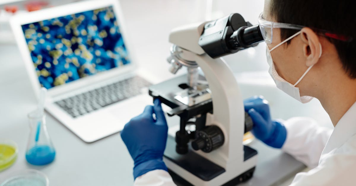 Scientist analyzing blood sample in laboratory for Parkinson's research