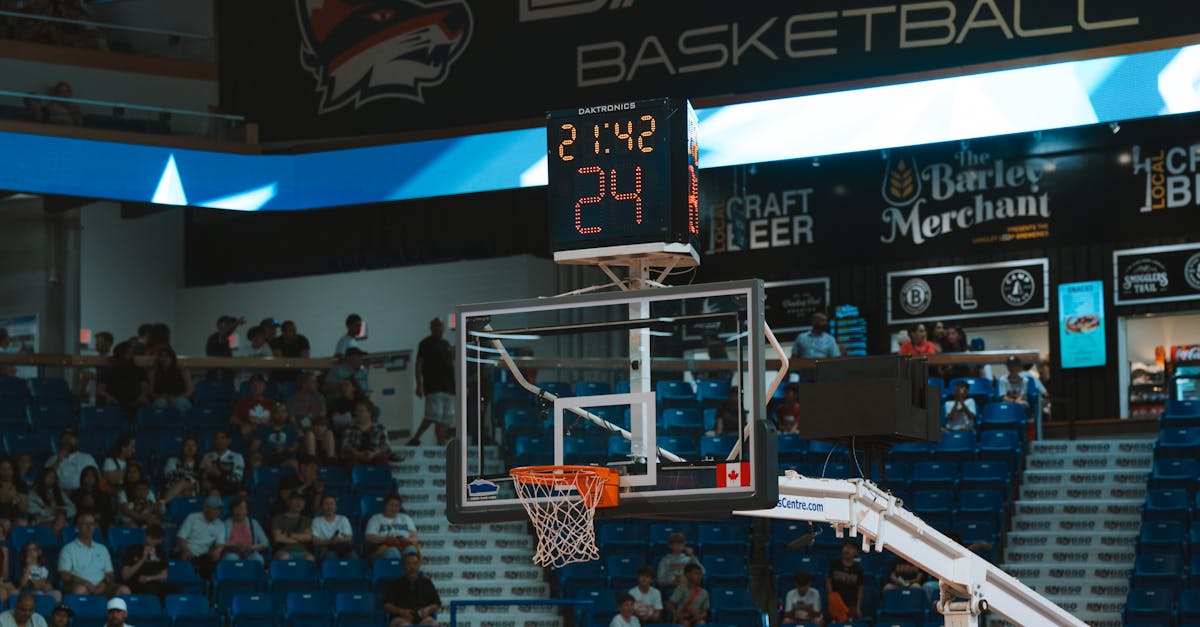 Empty college basketball arena during a mid-major game highlighting point-shaving scandal