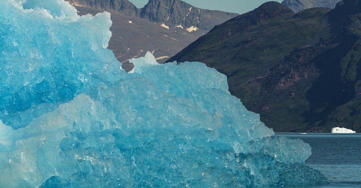 Aerial view of Greenland's icy terrain and mountains in the Arctic region