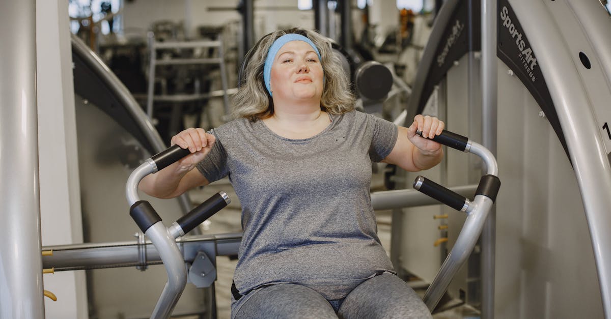 Group of middle-aged adults performing fitness tests like cycling and weightlifting in a Swedish research setting