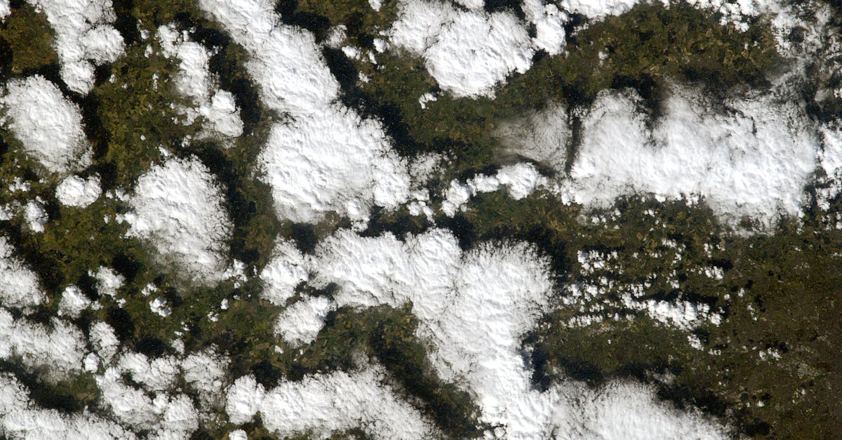 Satellite imagery showing global water patterns and weather systems across continents