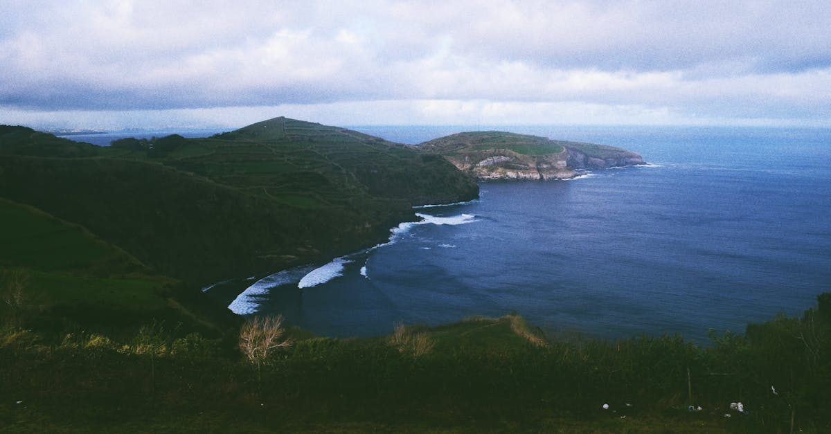 Scenic view of Azores islands with green hills and ocean, evoking the setting of Honeyjoon film