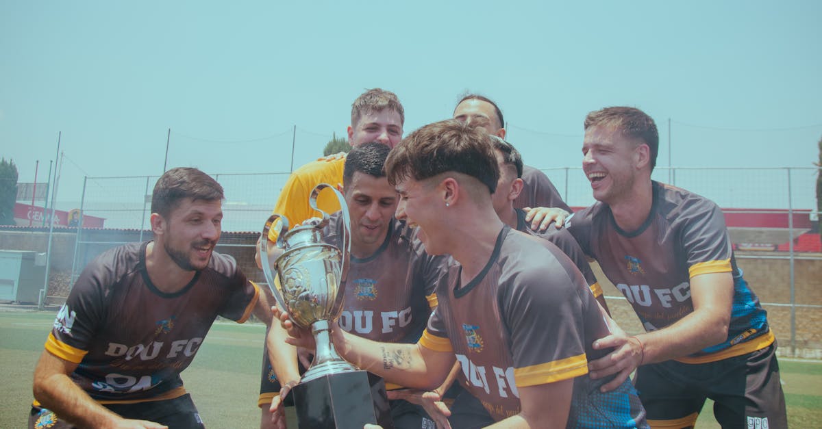 Indiana Hoosiers players hoist the College Football Playoff national championship trophy after defeating Miami