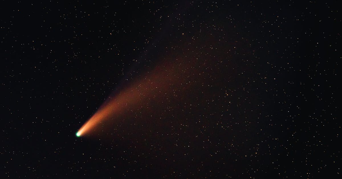 Artist's depiction of comet 3I/ATLAS showing expanded coma and gas emissions after perihelion