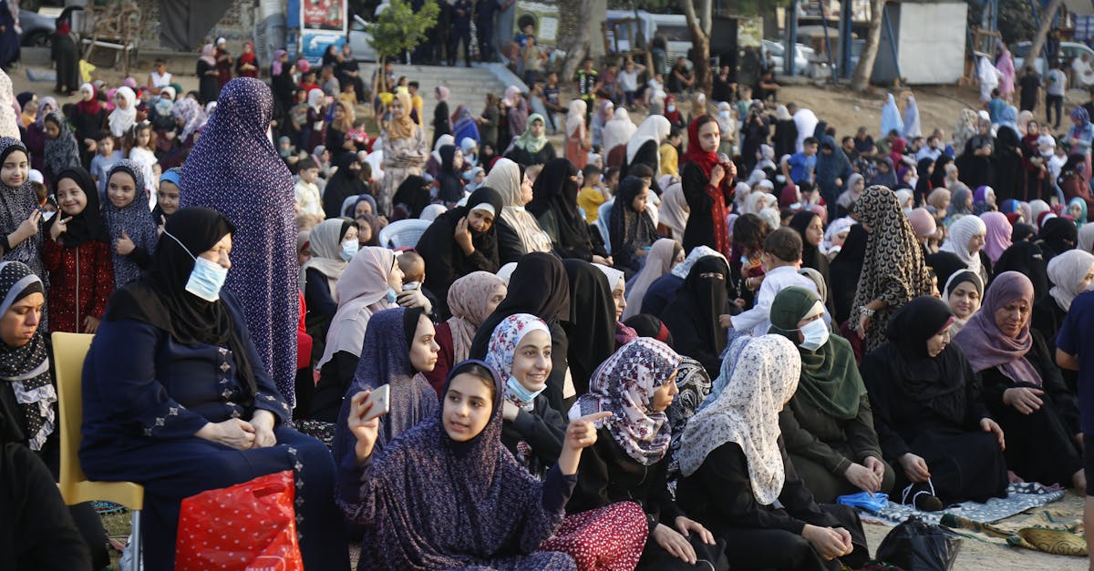 Ambulances and crowds near rubble in Gaza City following reports of strikes