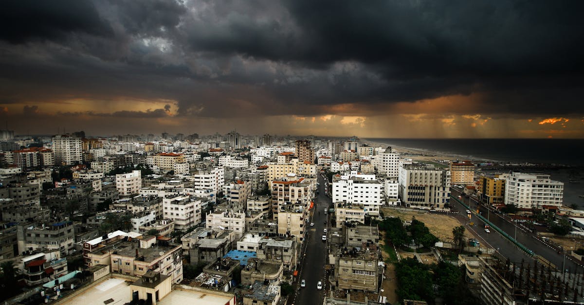 Smoke rises from struck buildings in Gaza amid ongoing conflict