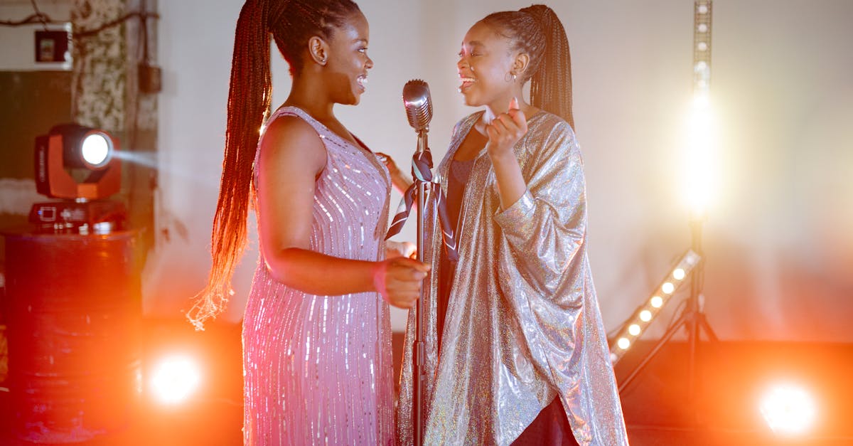 Women K-pop artists on stage during Grammy nominations announcement for 2026 awards