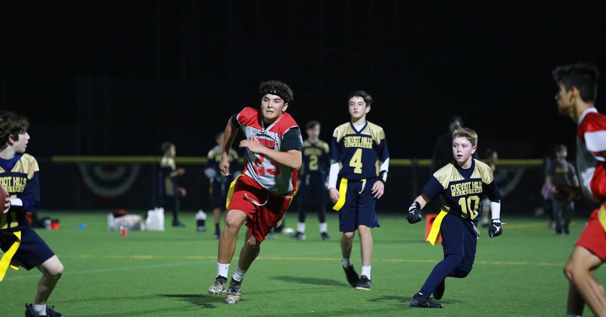 Rams and Seahawks players clash on the field during NFC Championship at Lumen Field
