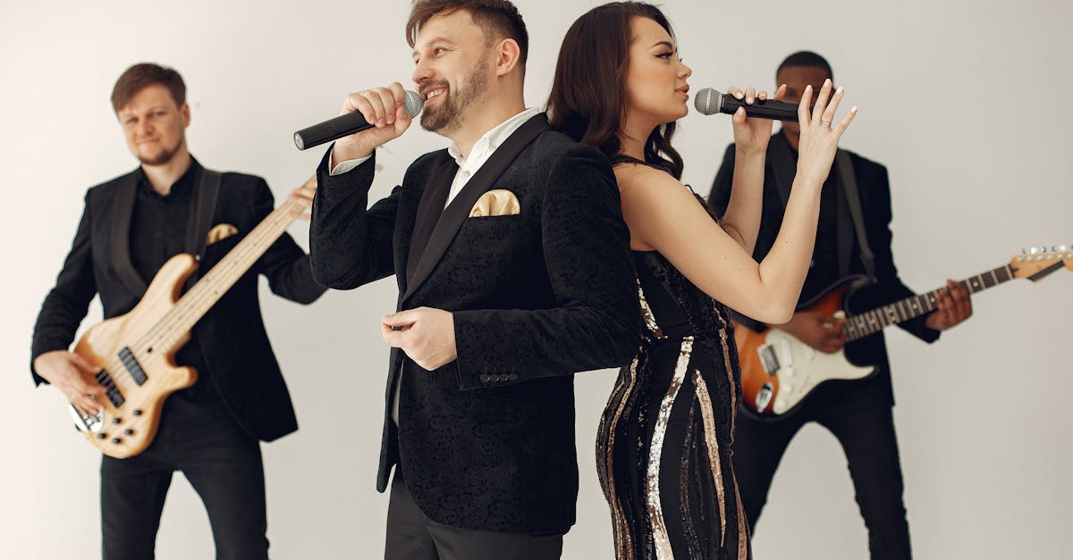 British artist Raye performing on stage during a concert