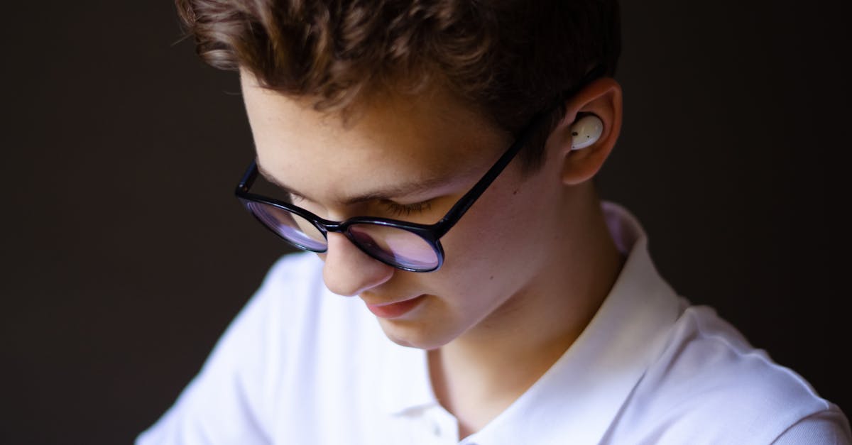 Close-up of person wearing glasses-style wearable device designed for eye muscle training and vision wellness