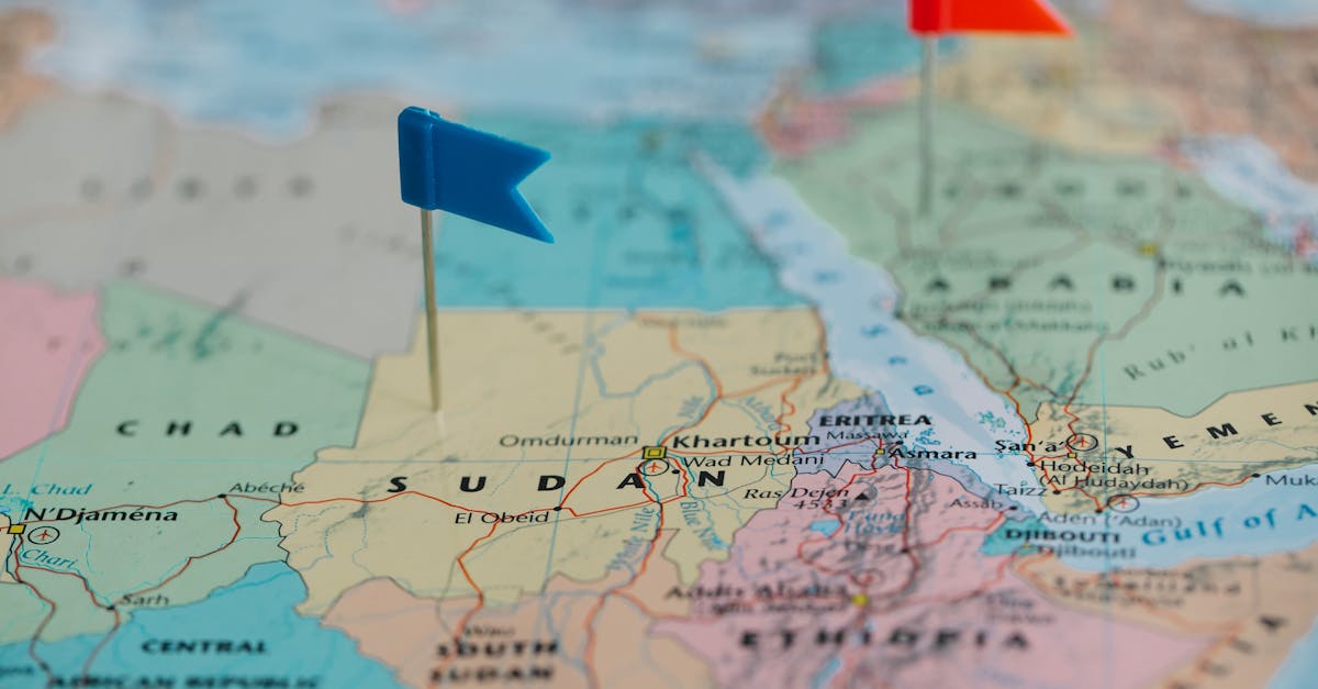 Map showing Greenland's location in the Arctic with flags of US and Denmark