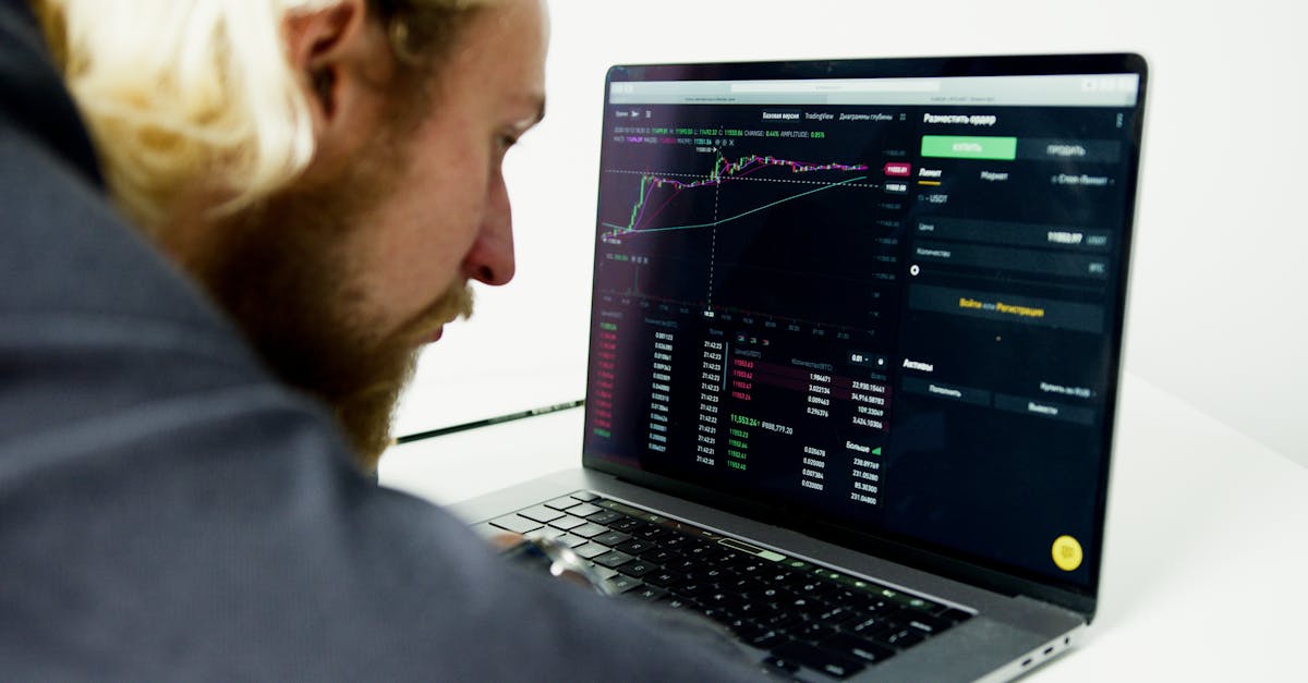 Traders on Asian stock exchange floor react to falling markets amid U.S. tariff news