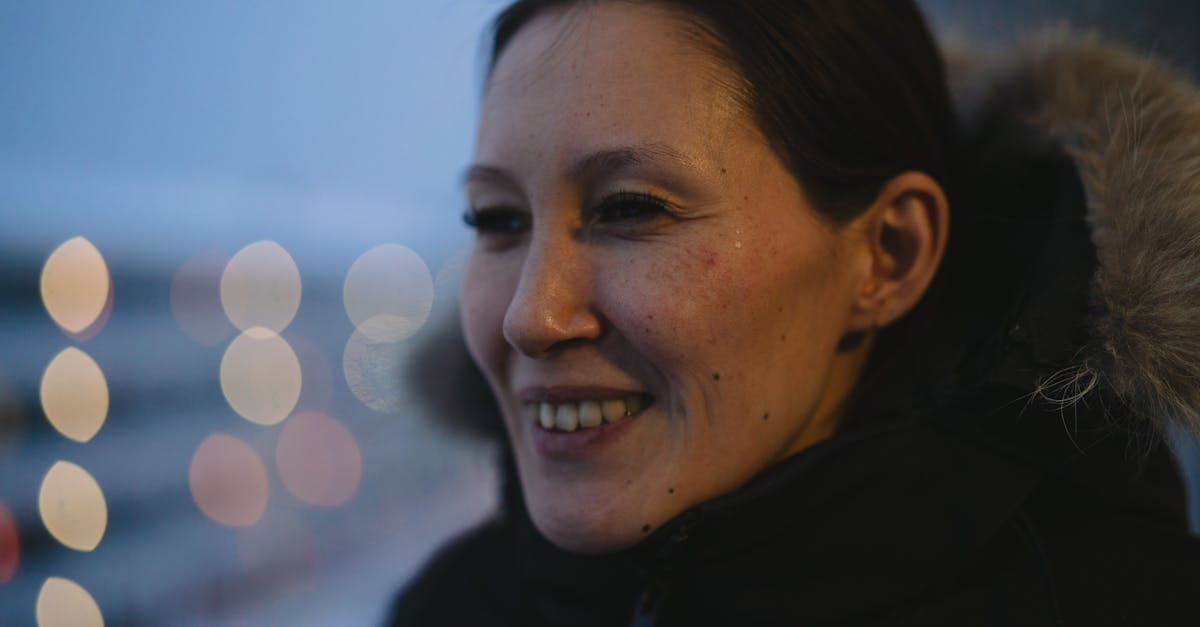 Crowd of protesters in Nuuk, Greenland, holding signs against US acquisition of the island