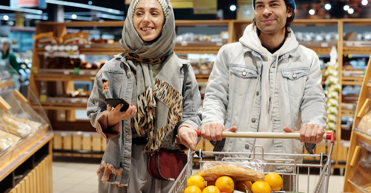 A couple shopping together in a grocery store during winter weather preparations