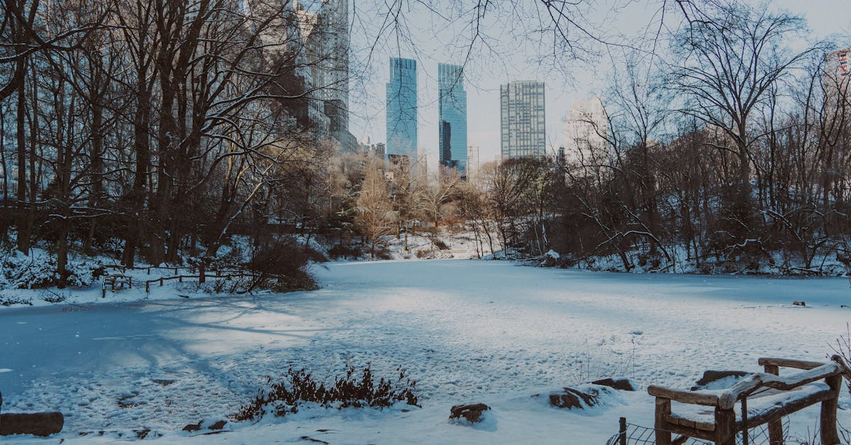 Snow piles up on streets near Central Park during winter storm in NYC