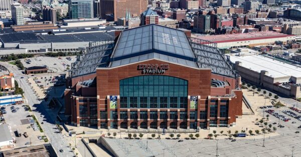 Fans and scouts watch prospects run drills at 2026 NFL Combine in Lucas Oil Stadium Indianapolis