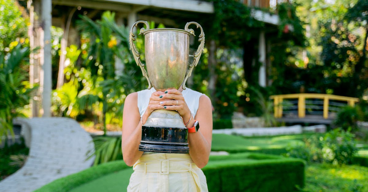 Carlos Alcaraz with Australian Open trophy after defeating Novak Djokovic in 2026 final
