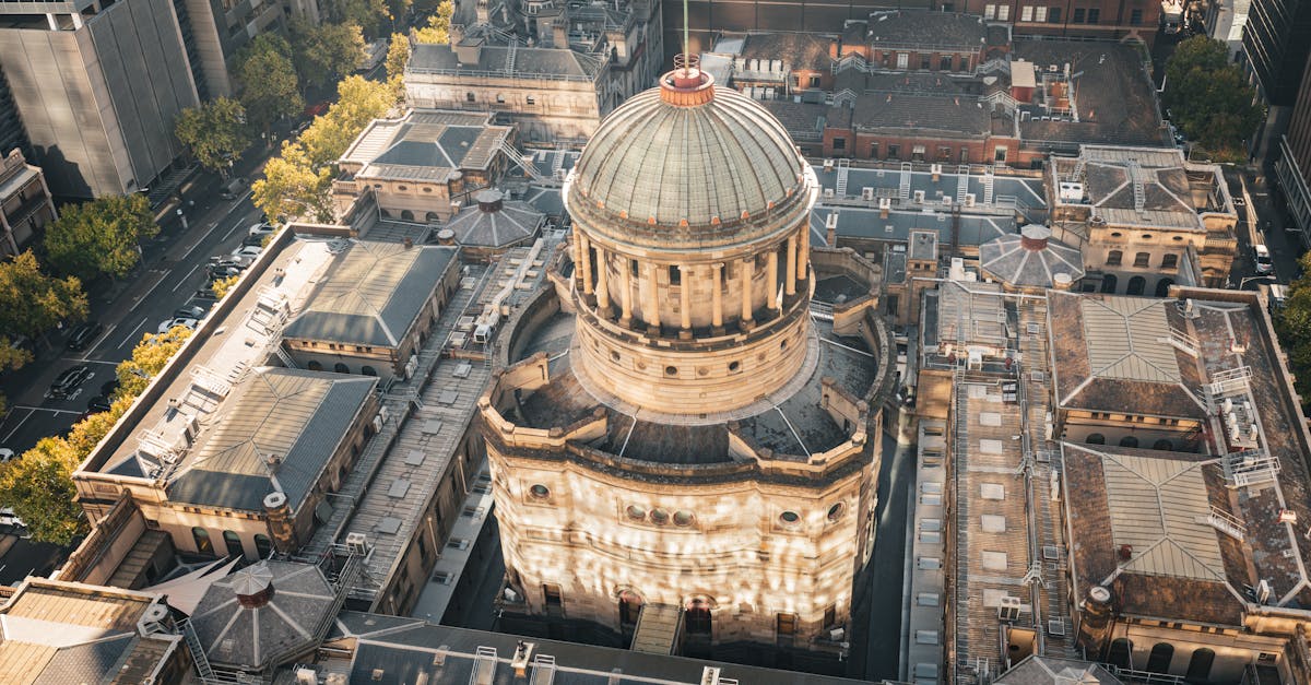 Carlos Alcaraz lifts the Australian Open men's singles trophy after defeating Novak Djokovic in the 2026 final