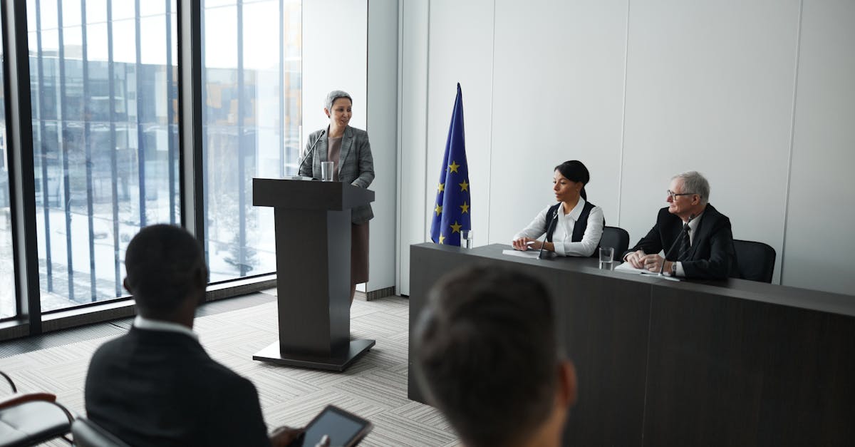 Dario Amodei of Anthropic at podium discussing AI policy