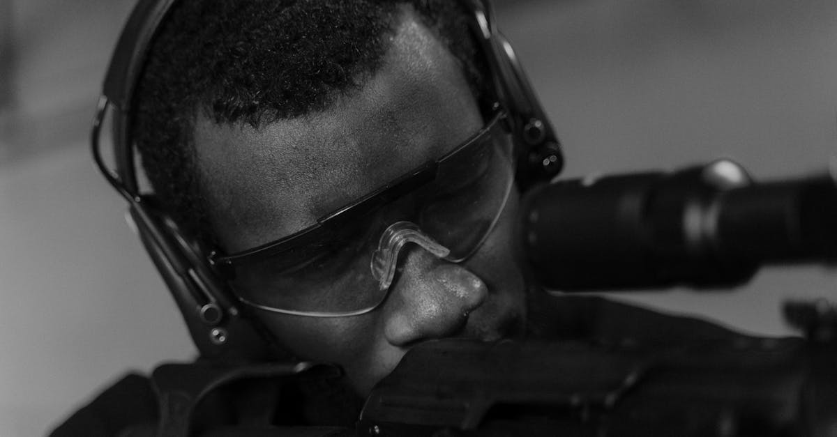 Screenshot from ARC Raiders showing players fighting mechanical enemies in a retro-futuristic environment