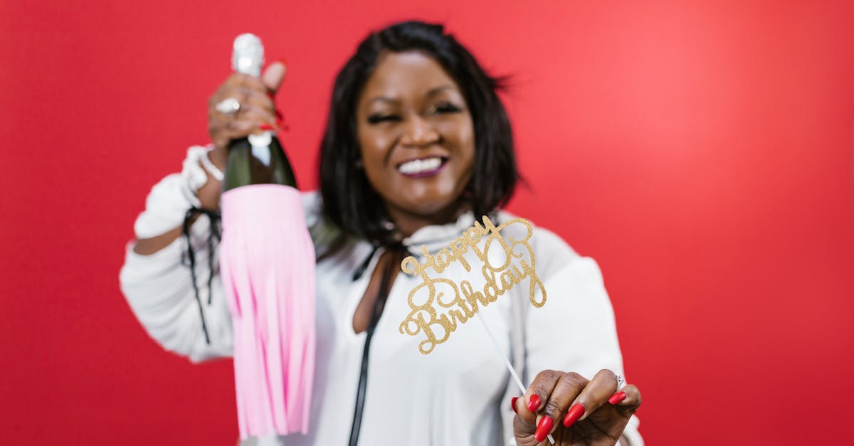 Ashley Graham with a bottle of her new Lucci Lambrusco sparkling red wine