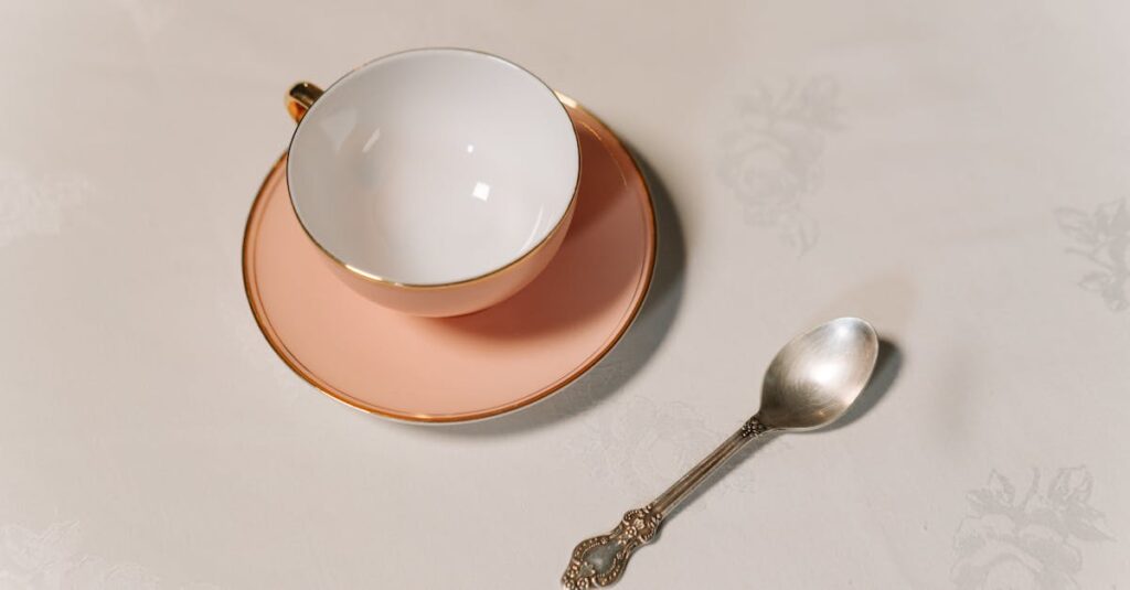 Bonobo Kanzi sitting at a table during a pretend tea party experiment with empty cups and pitcher
