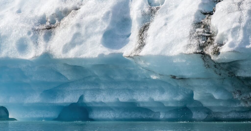 Melting Arctic sea ice under a hazy sky showing effects of global warming