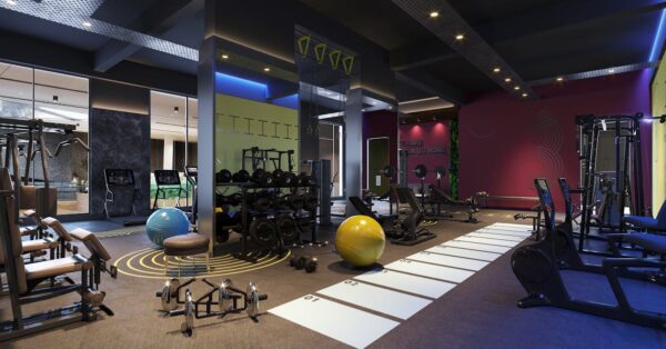 High-end fitness facility with personal training session and health monitoring technology
