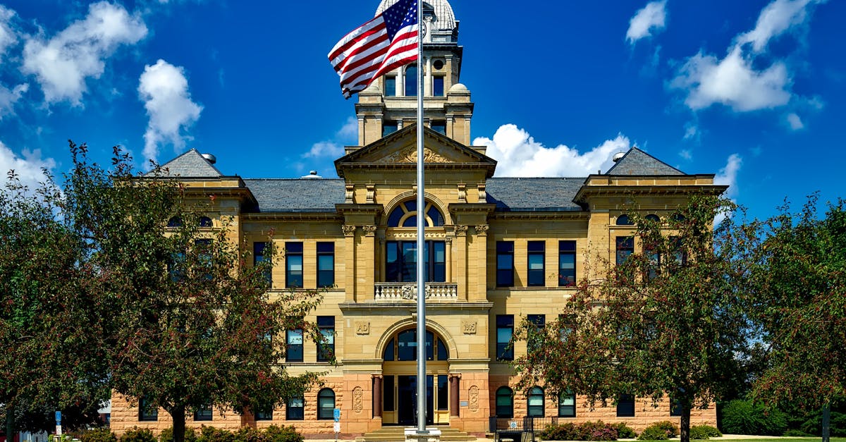 FedEx headquarters exterior with American flag, symbolizing lawsuit against US government over Trump tariffs
