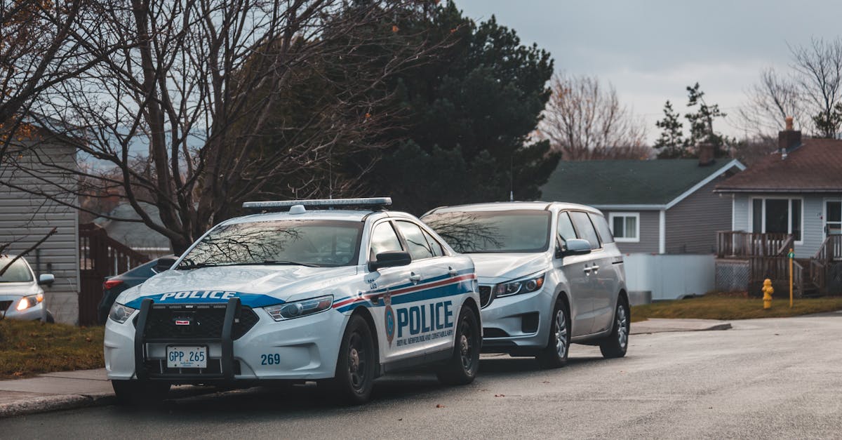 Unmarked police vehicles at a Norfolk estate during the arrest of Andrew Mountbatten-Windsor
