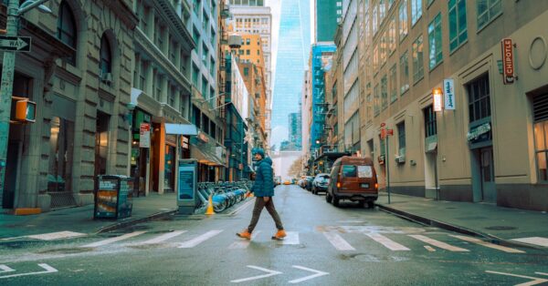Heavy snow falls on a New York City street during a nor'easter blizzard with reduced visibility and snow accumulation