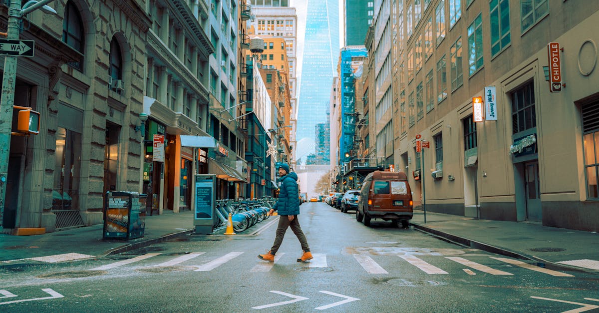 Heavy snow falls on a New York City street during a nor'easter blizzard with reduced visibility and snow accumulation