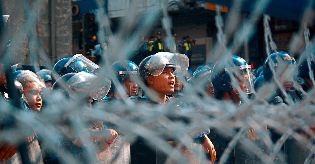 Crowd of protesters in Tehran streets during January 2026 Iran unrest with security forces visible