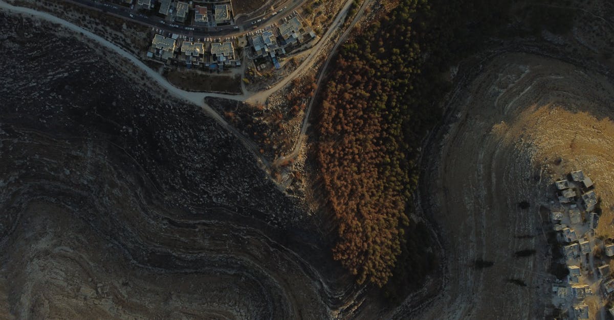 Aerial view of West Bank landscape showing Israeli settlements and Palestinian villages