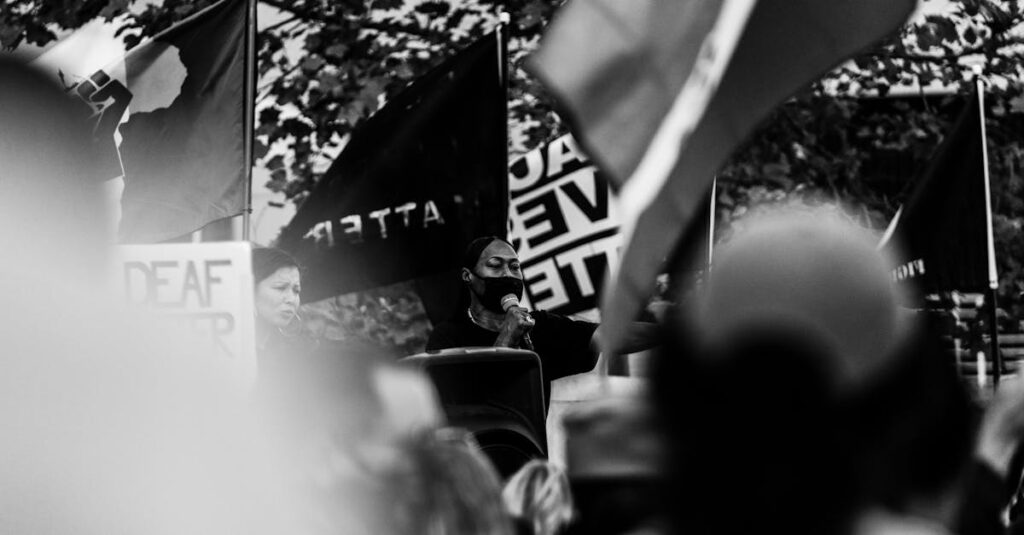 Rev. Jesse Jackson addressing crowd at civil rights event