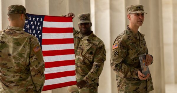 Kenyan flag with military background representing recruitment crisis