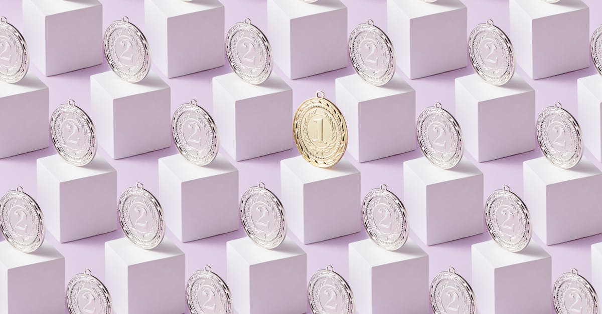 Elana Meyers Taylor raises arms in celebration after winning gold in women's monobob at 2026 Winter Olympics in Cortina d'Ampezzo