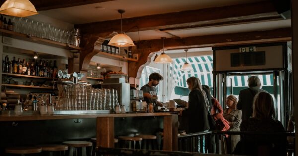 Lesley Manville and Ciarán Hinds walking in Amsterdam for Midwinter Break movie