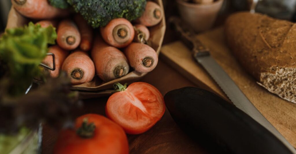 Assortment of Nordic diet foods including vegetables, fish, whole grains, and legumes arranged on a table