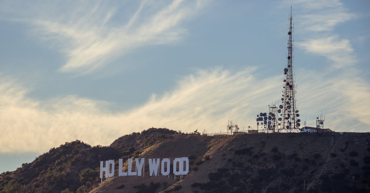 Executives shaking hands over Warner Bros. Discovery and Paramount merger deal