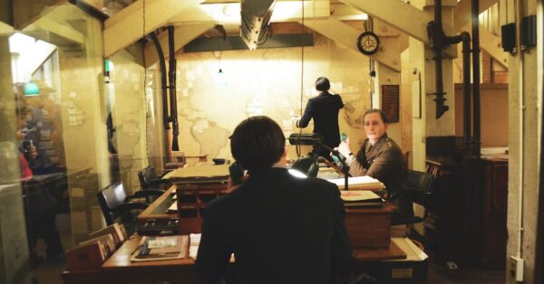 Pentagon military officials in a briefing room discussing military operations