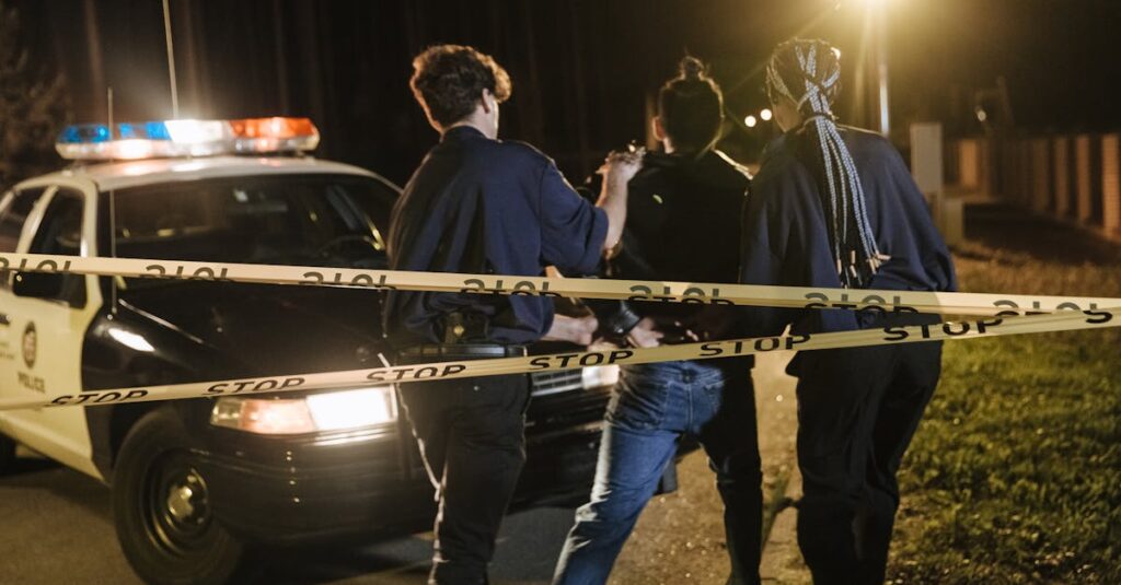 Thames Valley Police vehicles at Wood Farm estate in Norfolk following arrest of Andrew Mountbatten-Windsor
