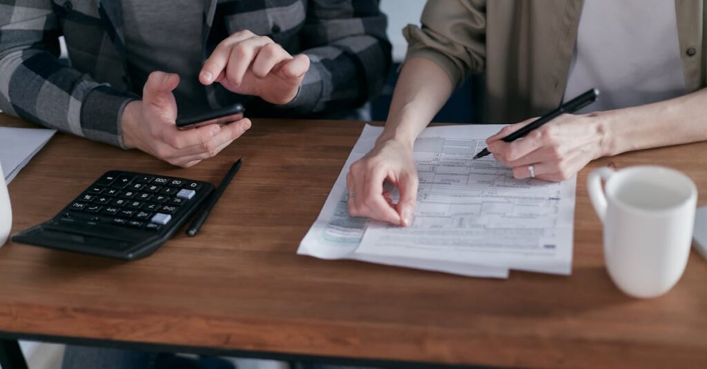 A homeowner reviewing property tax paperwork and documents while planning a home sale