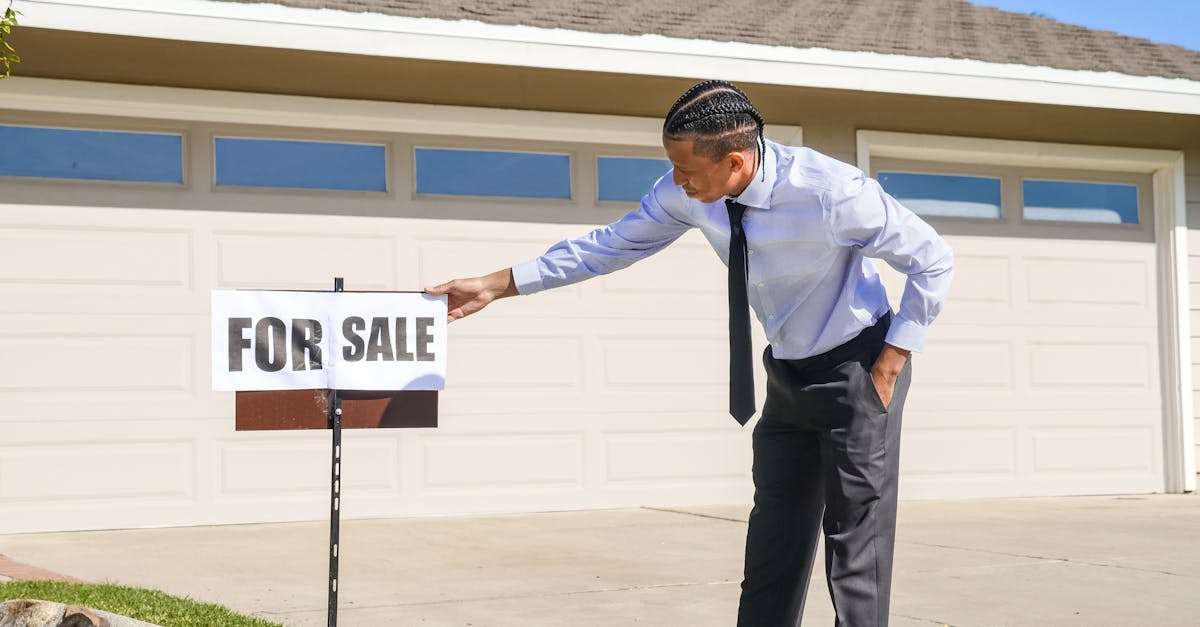 Senior homeowner stands outside home with for sale sign amid California wildfire recovery neighborhood