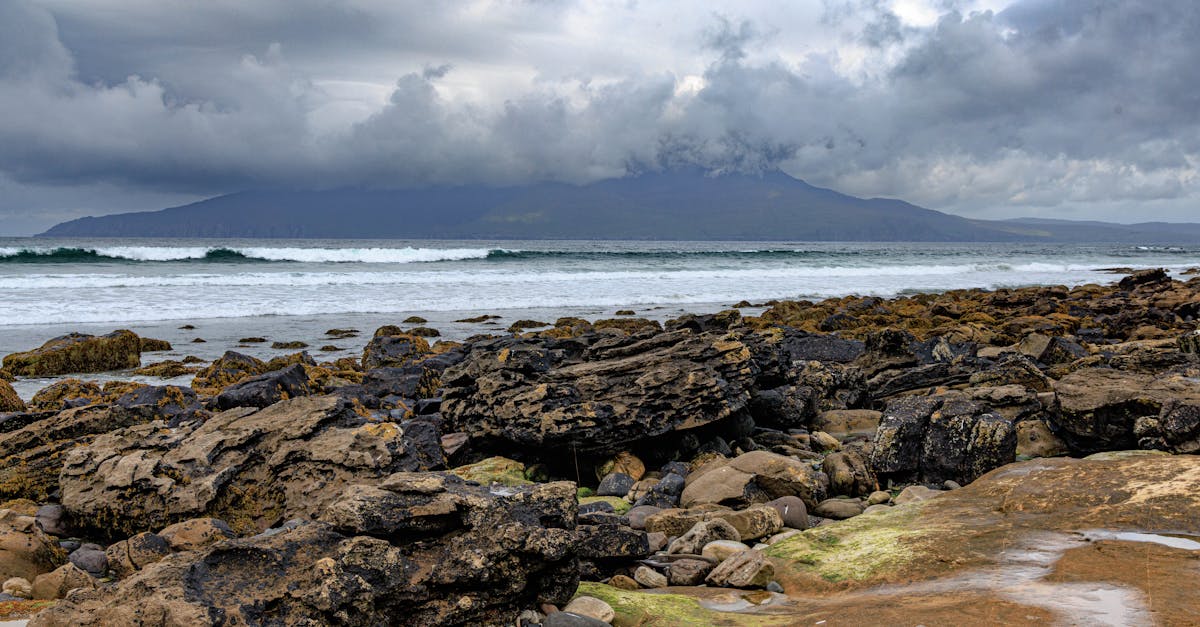Rocky shoreline of Garvellach Islands in Scotland showing layered ancient glacial deposits from Snowball Earth period