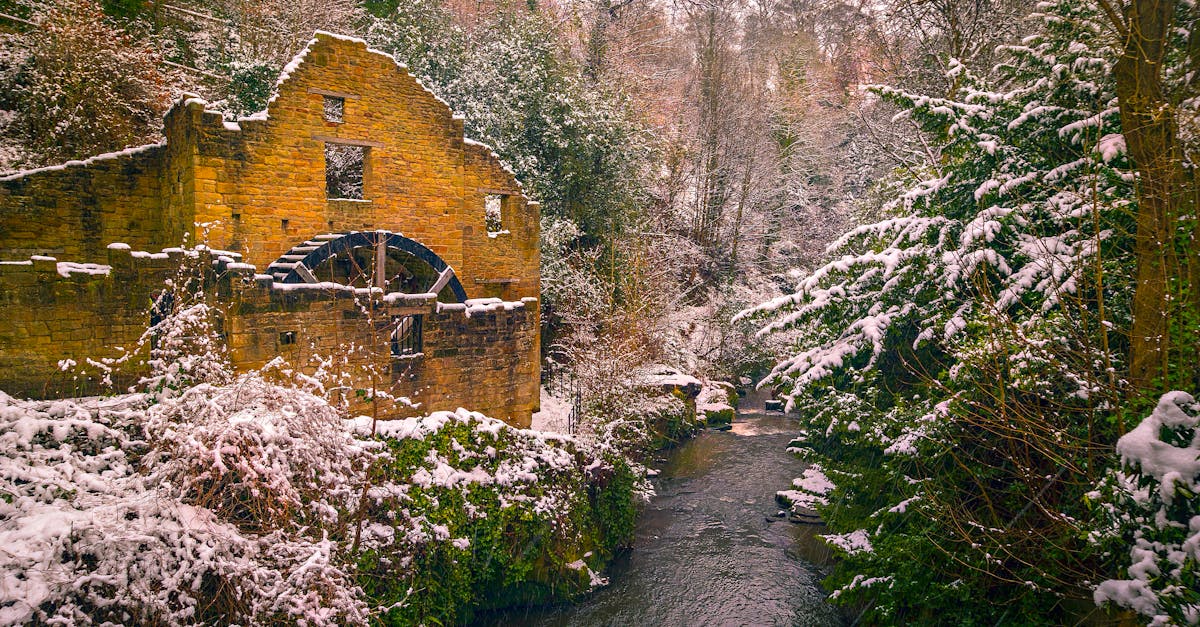 Winter view of abandoned Pittsburgh steel mills with faint gymnast silhouette in foreground