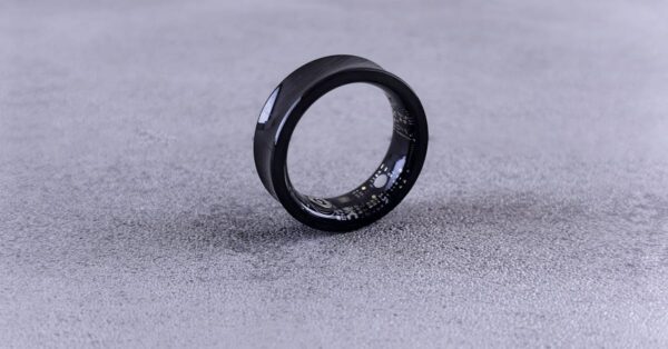 Ultrahuman Ring Pro smart wearable ring in raw titanium finish on finger