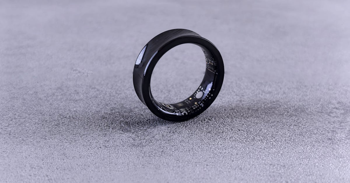 Ultrahuman Ring Pro smart wearable ring in raw titanium finish on finger